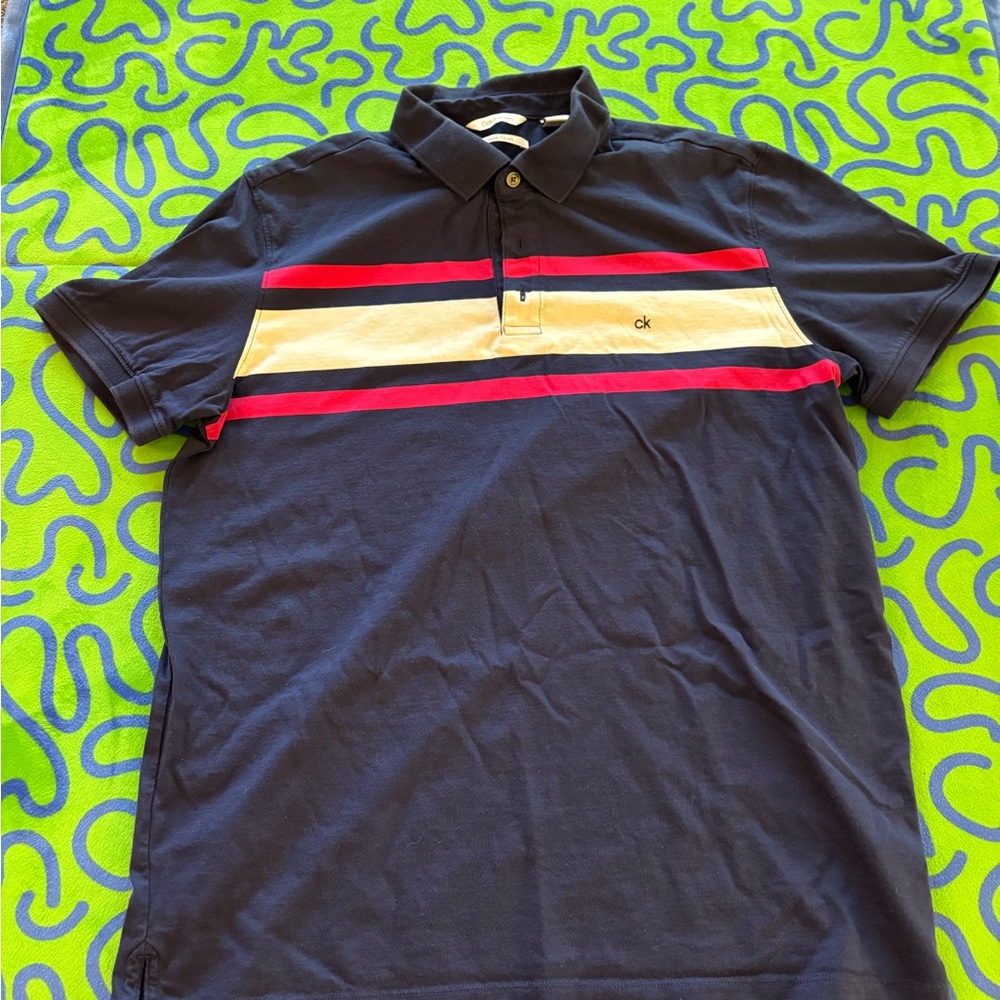 Calvin Klein Dark Blue Polo with Red and Cream Accents